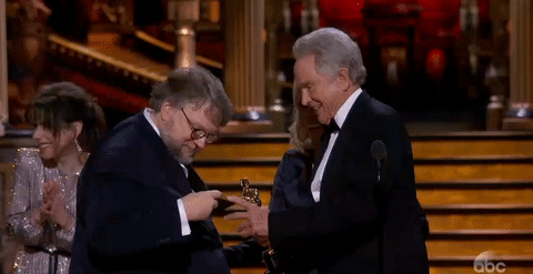 Guillermo Del Toro Checks Oscar Envelope GIF
