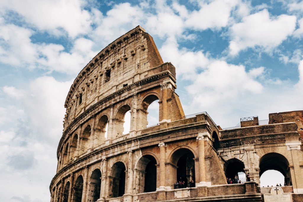 Photo of the Colosseum during the day. Photo by David Libeert on Unsplash.